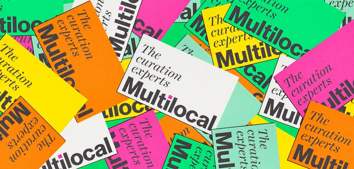 Scattered Multilocal cards in bright colours reading The curation experts