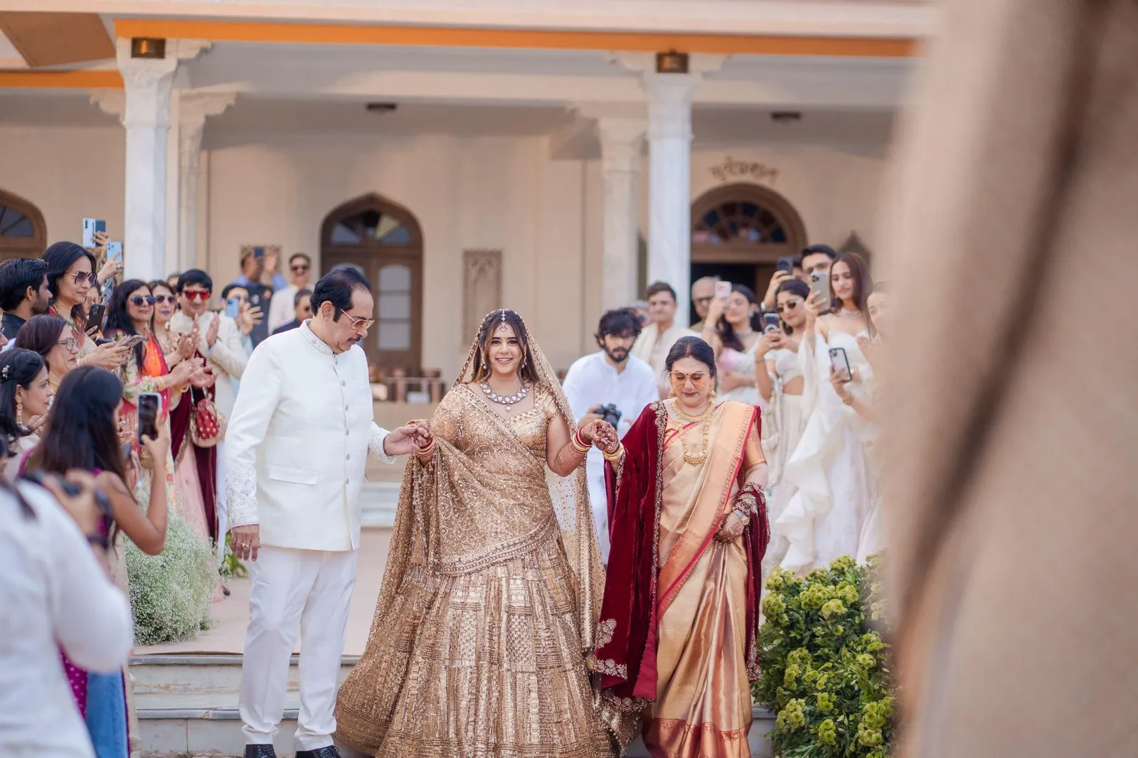Wedding aisle in ivory and gold — Juvhi and Divij real wedding