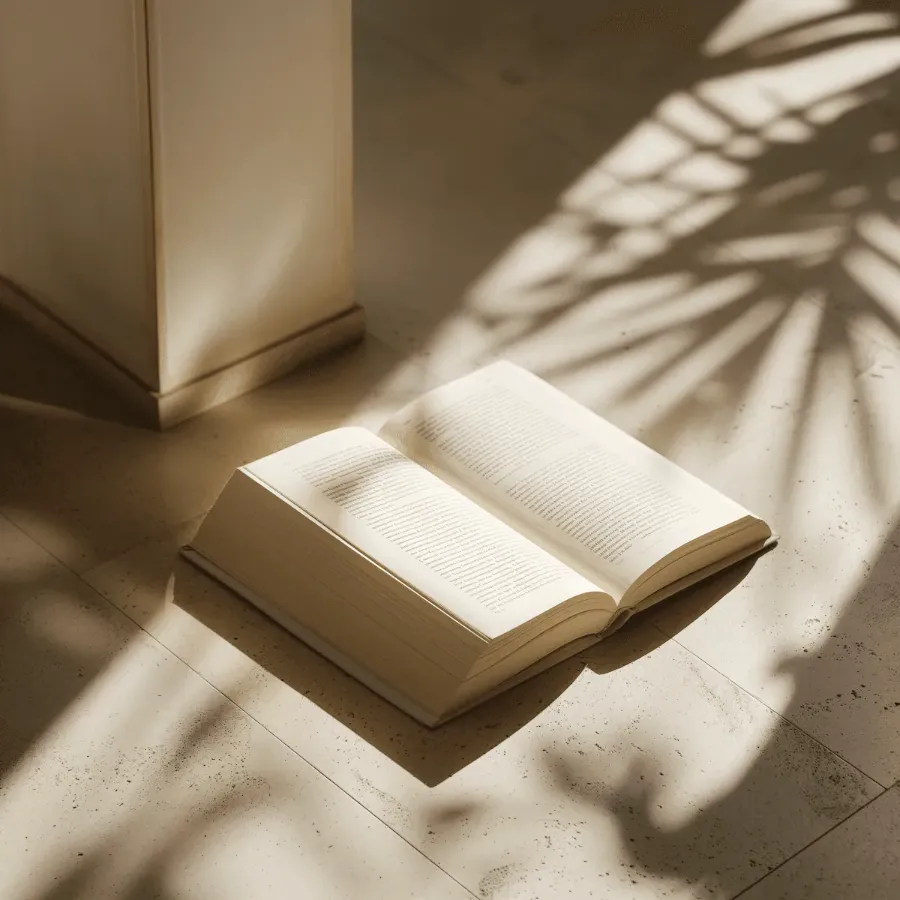 A open Book on the floor.