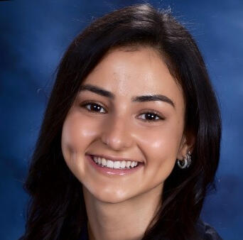 Formal portrait of a man in a dark suit