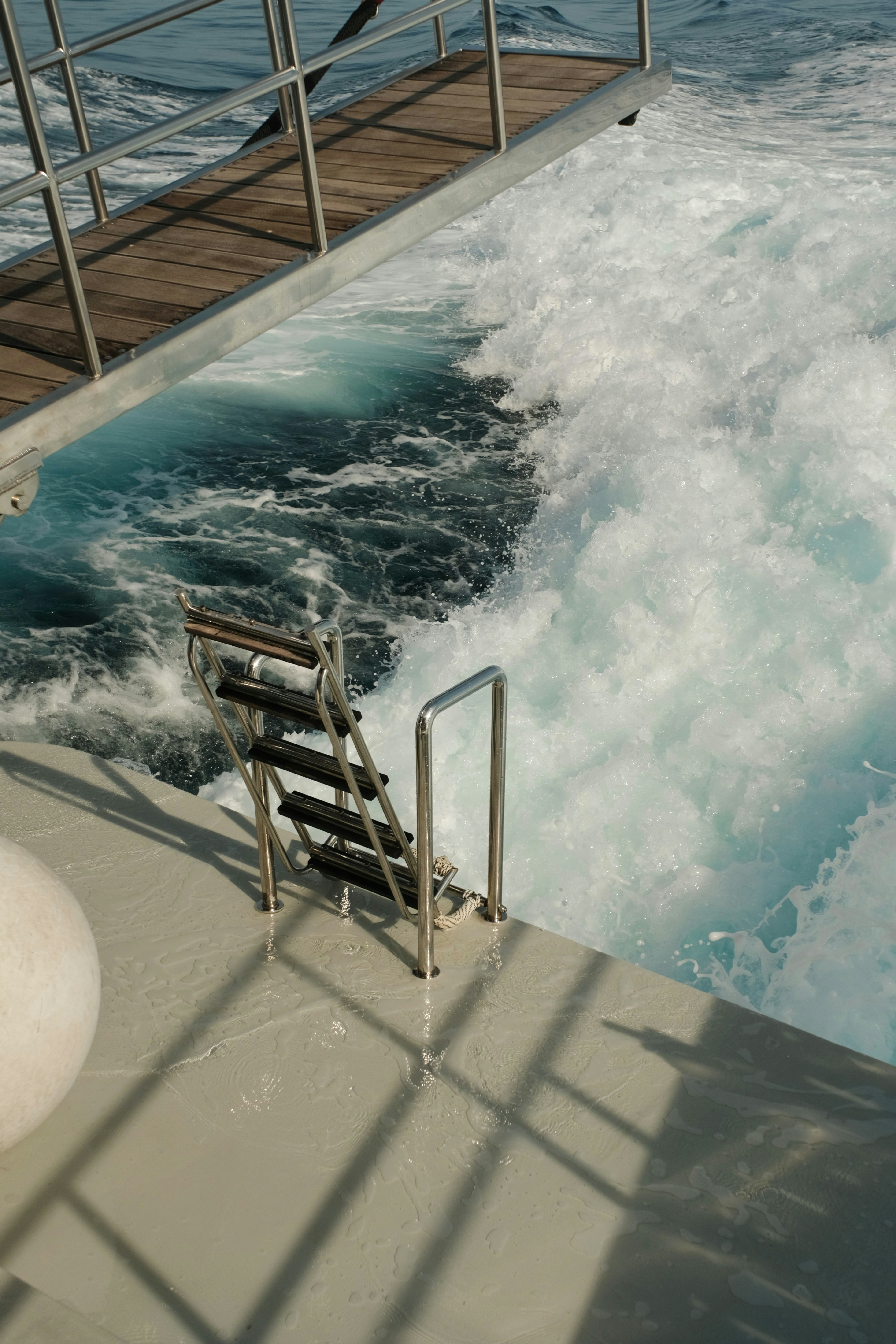 Boat wake with a boarding ladder and walkway.