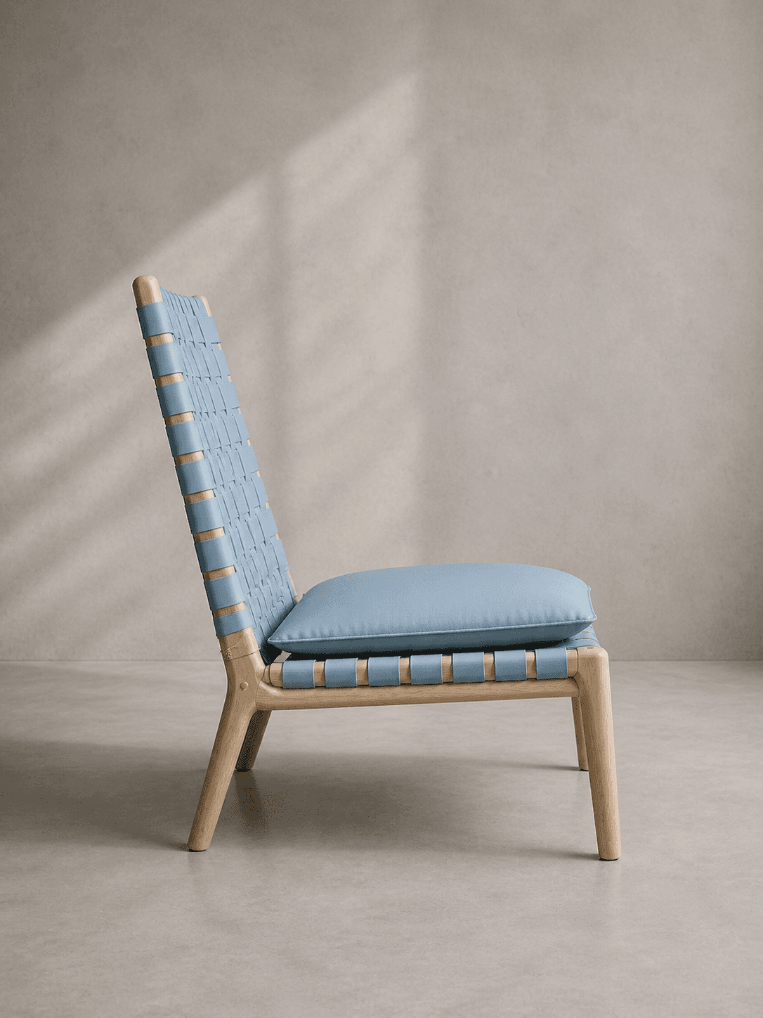 Later view of a blue leather chair