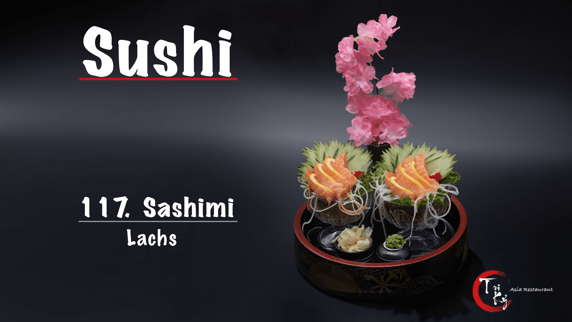 Lachs Sashimi angerichtet in einer runden Bentobox