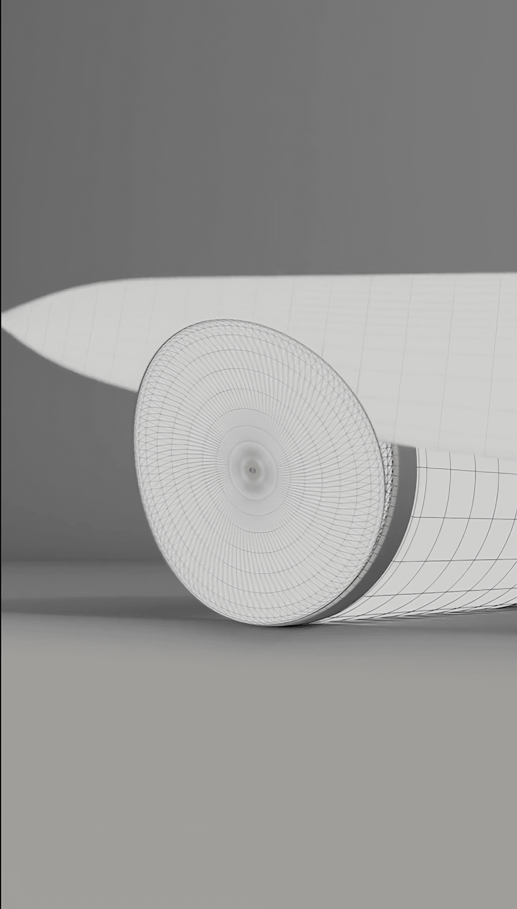 A grayscale 3D wireframe model shows a large knife slicing through a cylinder that becomes a record