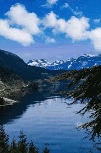 Serene Lake and Snow-Capped Mountains Landscape