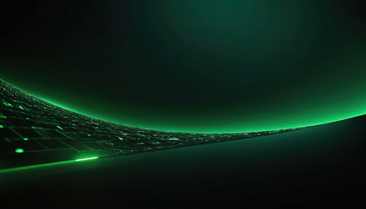 Glowing green laptop keyboard with dark background