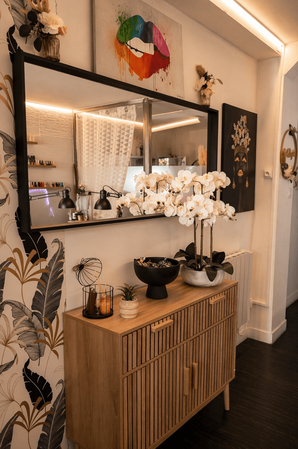A beautifully arranged table with various dishes, including fruits, bread, and wine, set for a meal.