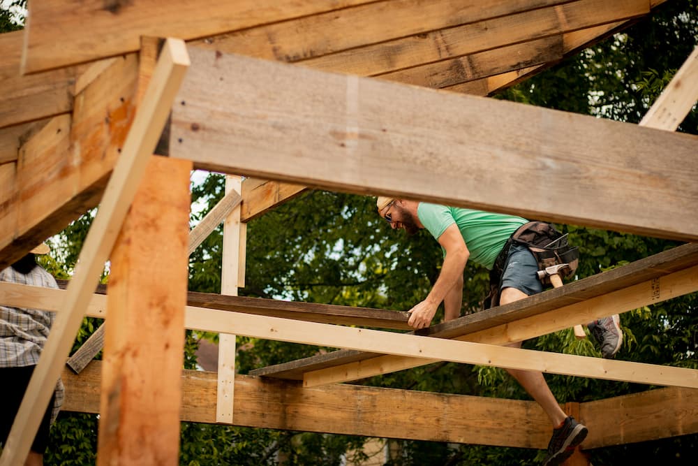 Carpenter working on a  roof