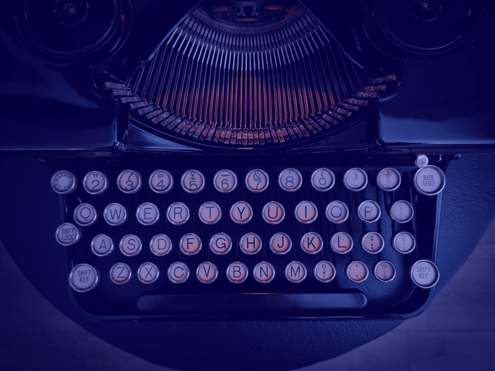 A close up photo of a typewriter.
