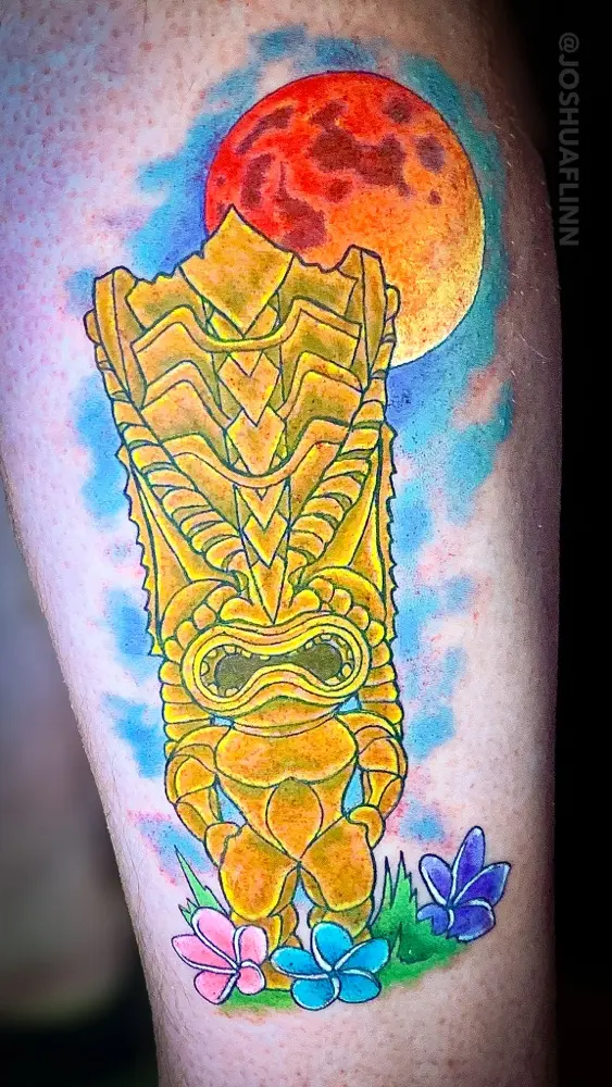 watercolor blood moon and tiki tattoo