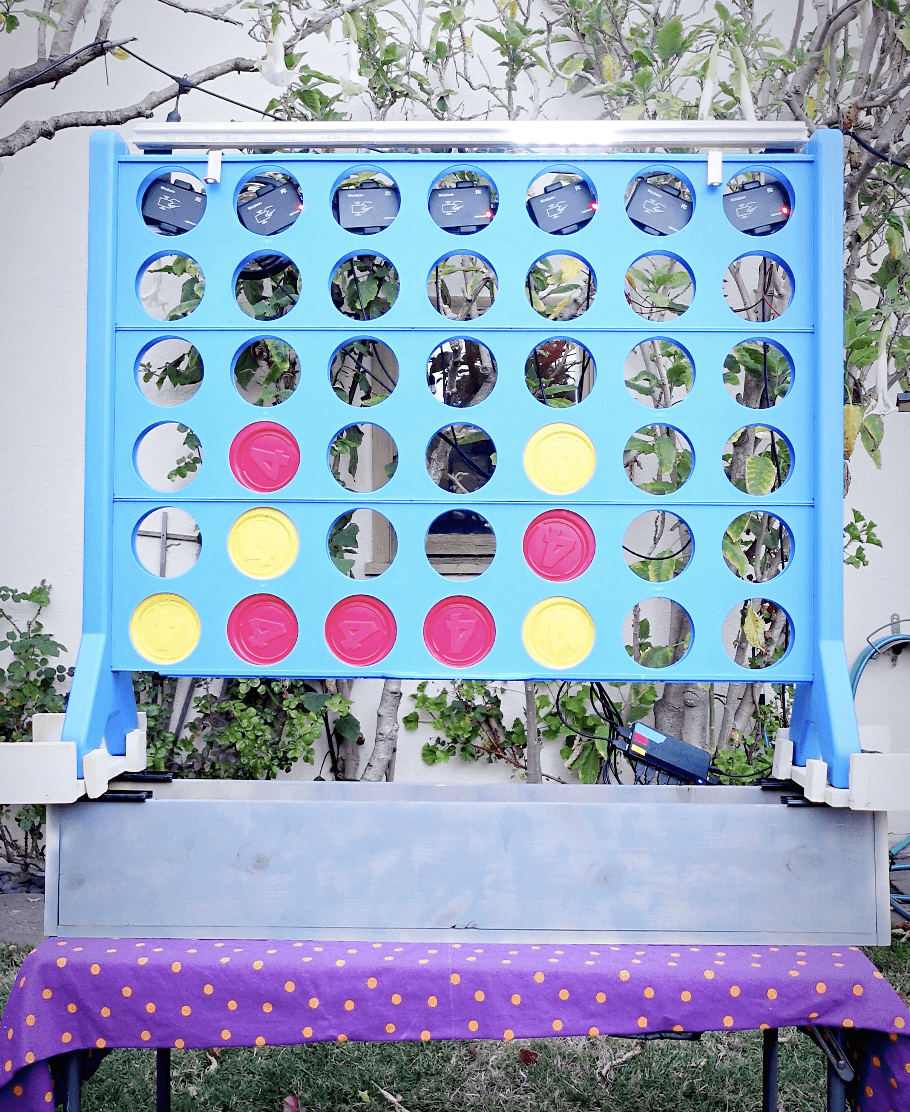 Large blue connect 4 board with red and yellow discs