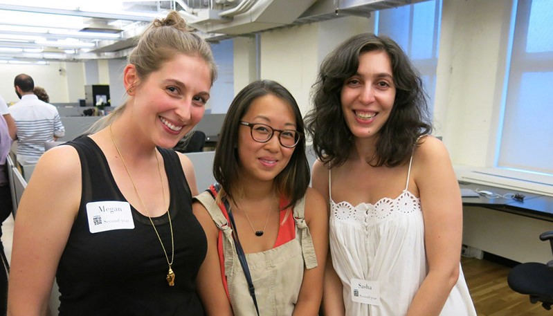 portrait of three girls, the one in the left dressed in black, the one in the middle dressed in beige with a red undershirt, and the last one dressed in white