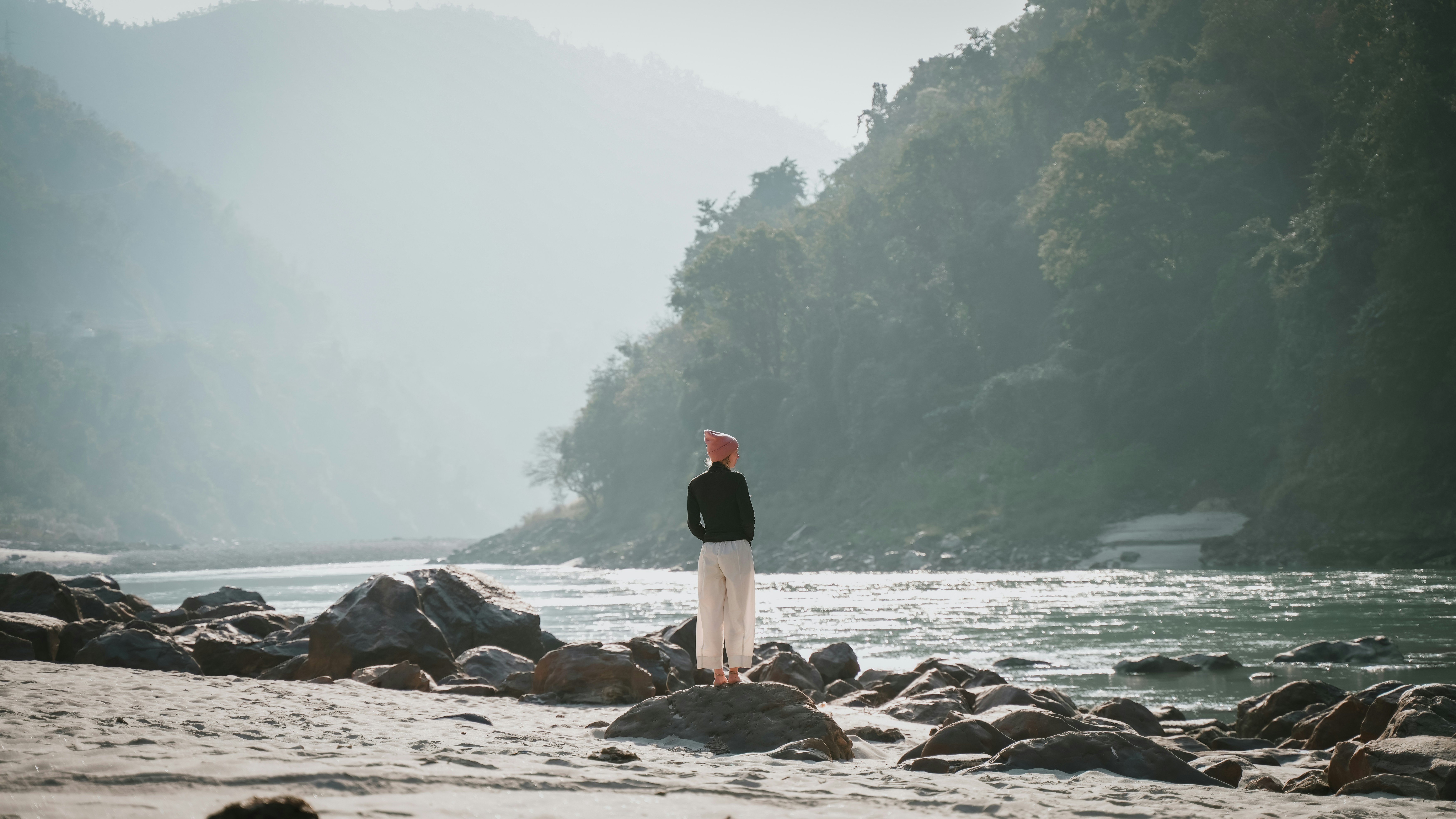 Lady standing near Ganga river