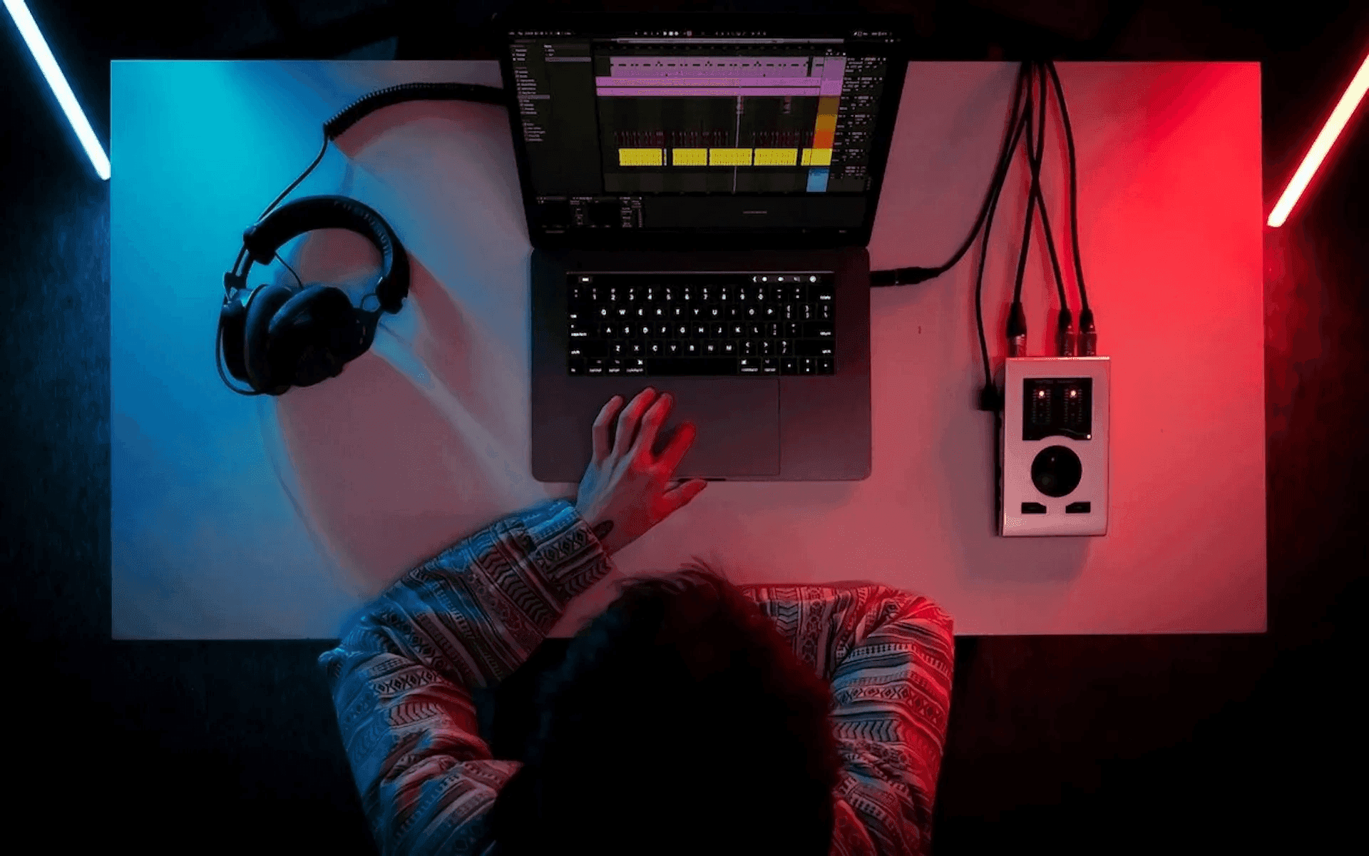 Person editing audio on their laptop - How Long Does A Document Review Take
