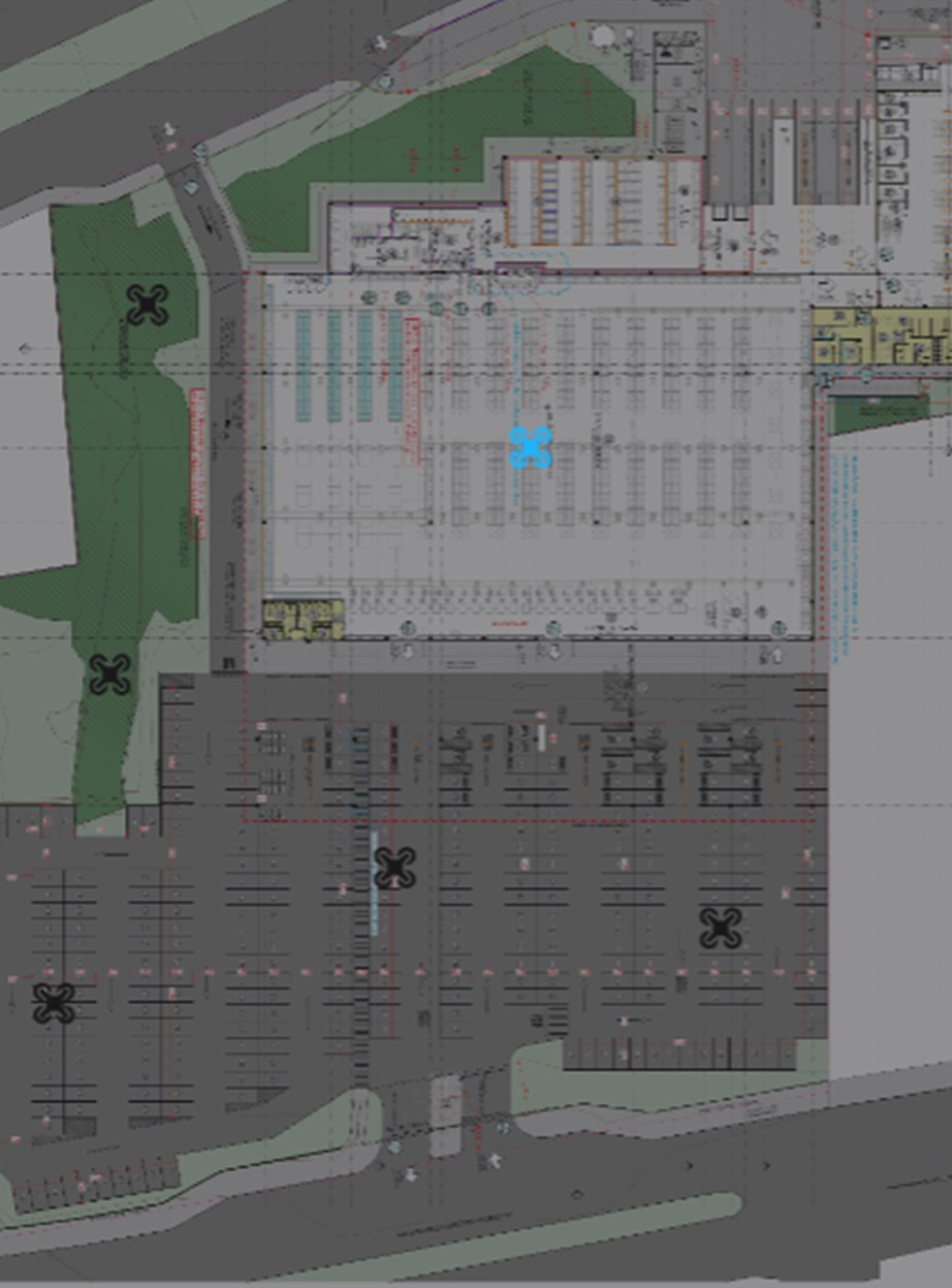 Planta técnica de um grande pavilhão industrial com ícones de drones azuis e pretos espalhados. Os ícones indicam os pontos exatos onde foram realizadas as capturas aéreas, garantindo a rastreabilidade total das imagens.