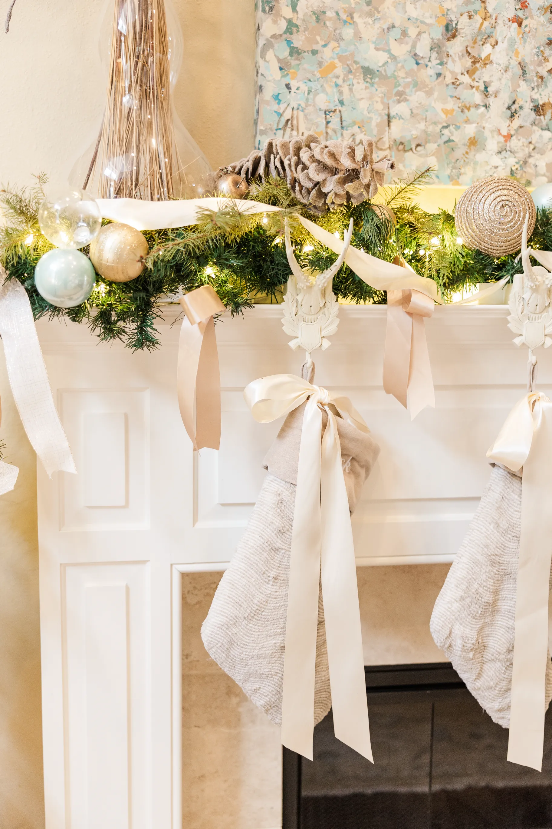 Luxury table setting by Sarah Overall Events with pink embroidered napkins, gold-rimmed plates, floral arrangements, and personalized menus in Shreveport.