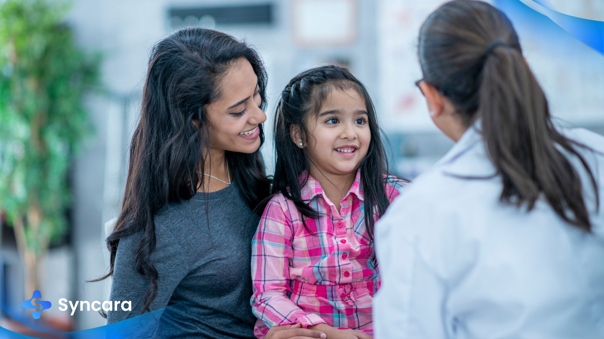 Family doctor consulting family patient at a Barrie clinic