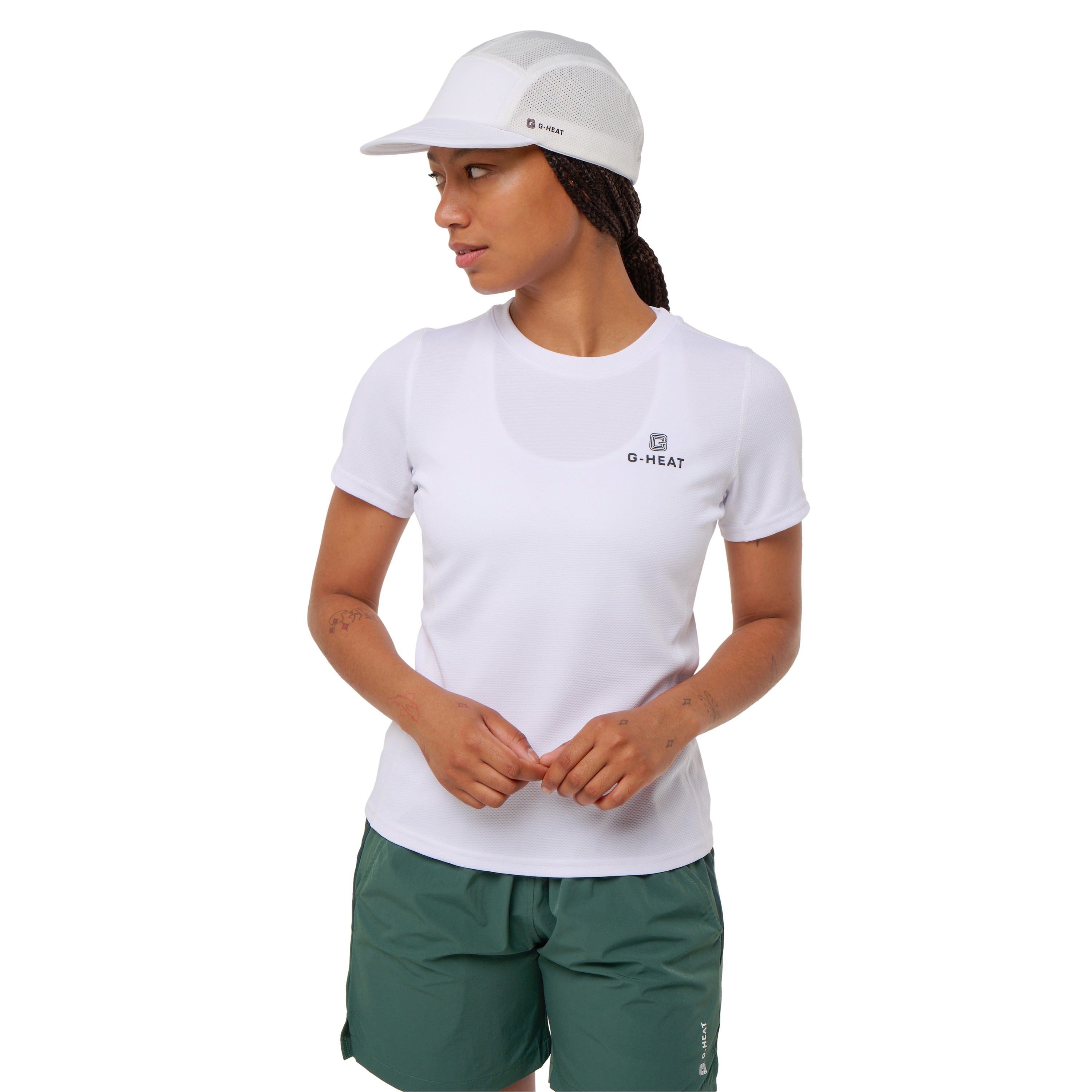 Women’s white G-Heat cooling T-shirt worn with shorts and a cooling cap, white background