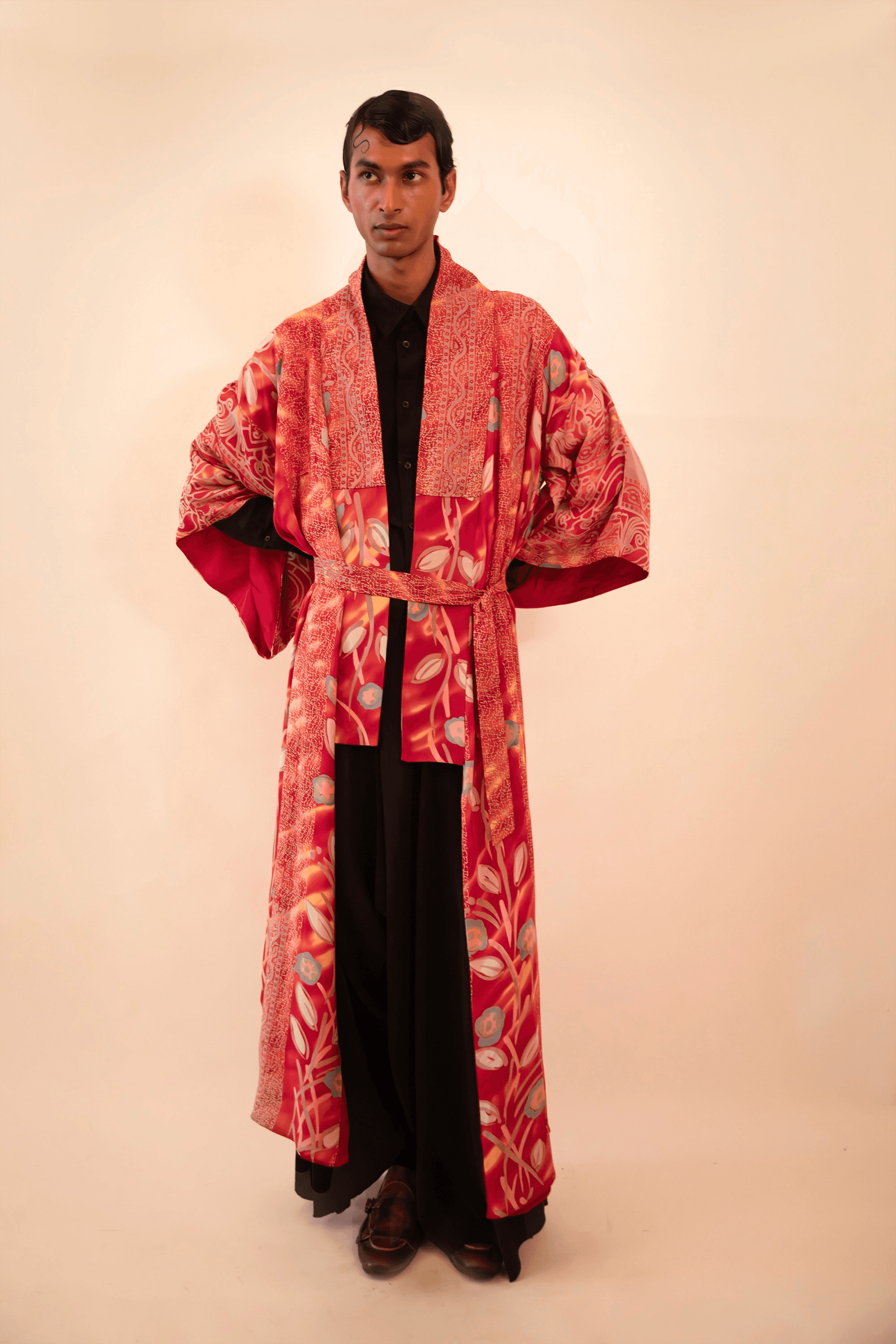Lalita is our one-of-a-kind red printed silk kimono, handcrafted by skilled artisans in-house using a vintage silk sari.