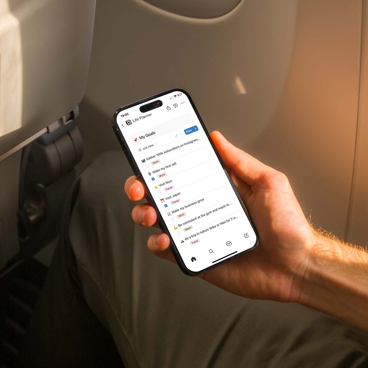 Someone using the Life Planner on phone