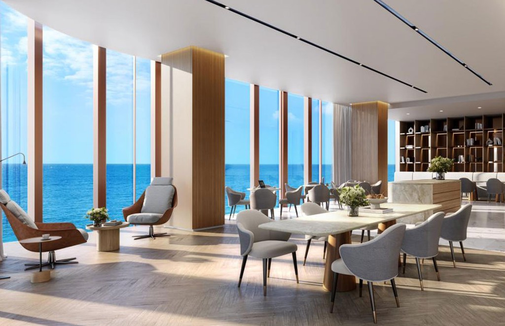 Elegant lobby of the Miami oceanfront hotel, showcasing contemporary design and panoramic views of the sea.