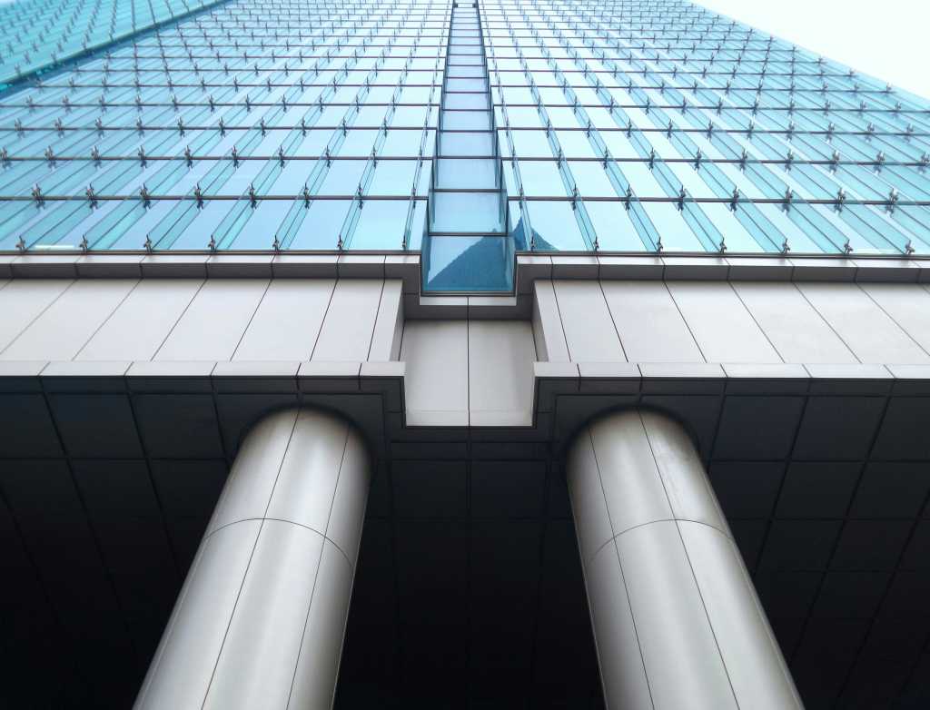 Bottom view photography of curtain wall building