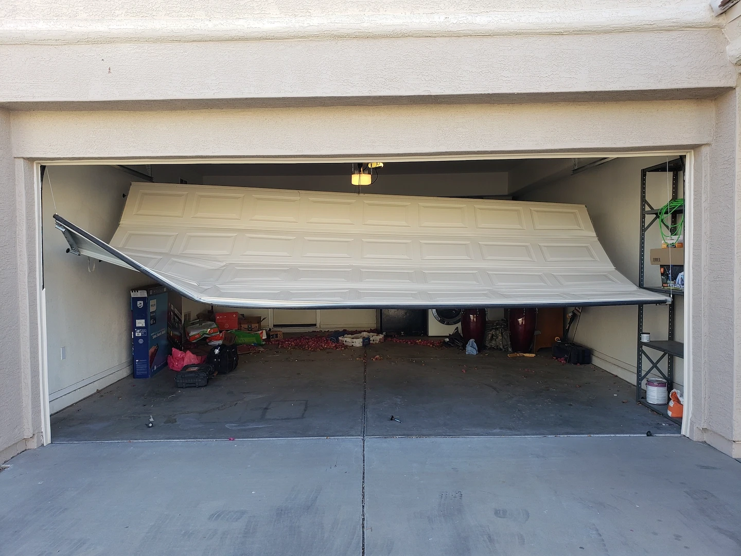 Broken garage door before replacement