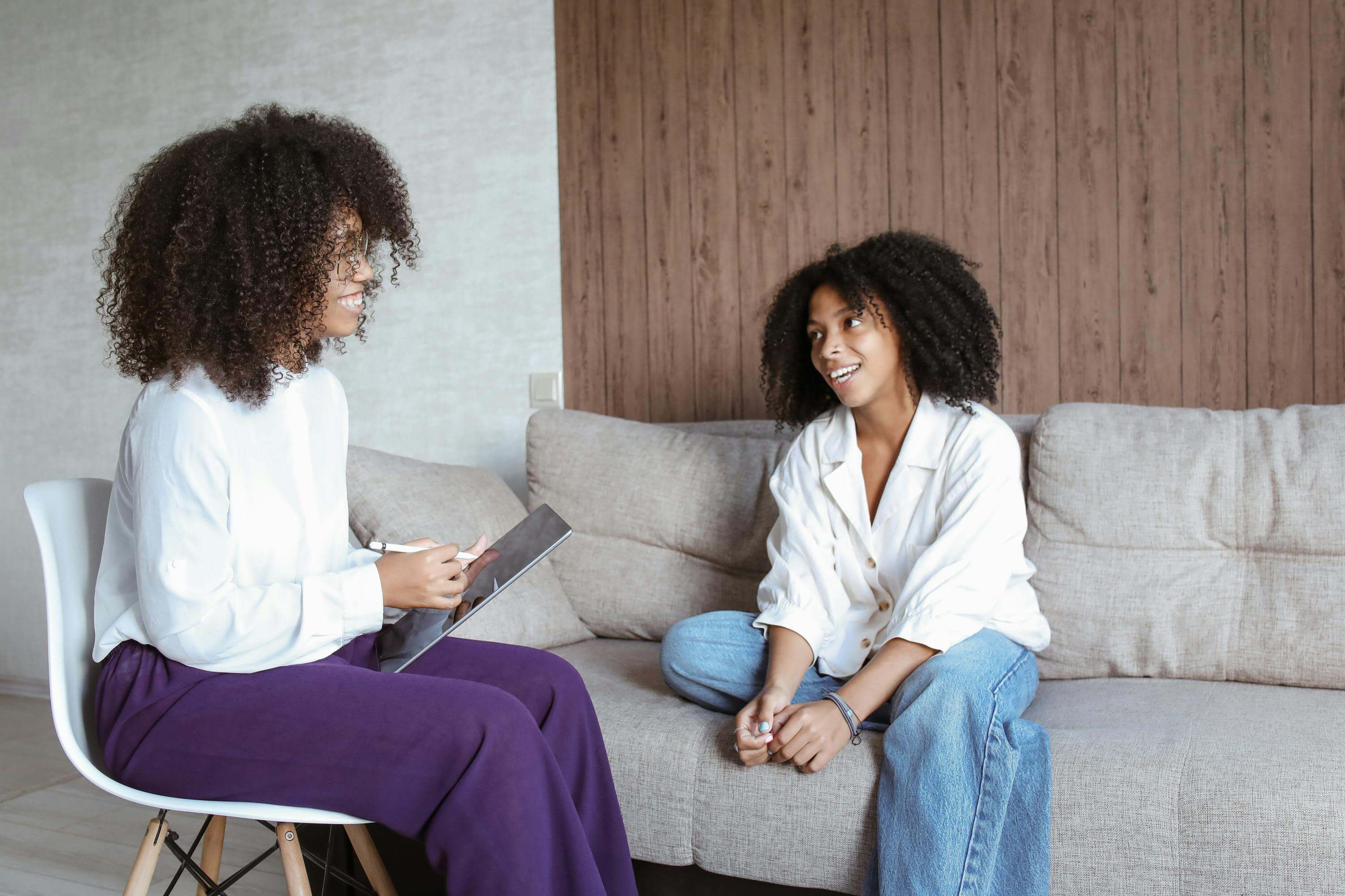 A therapist and her patient talking