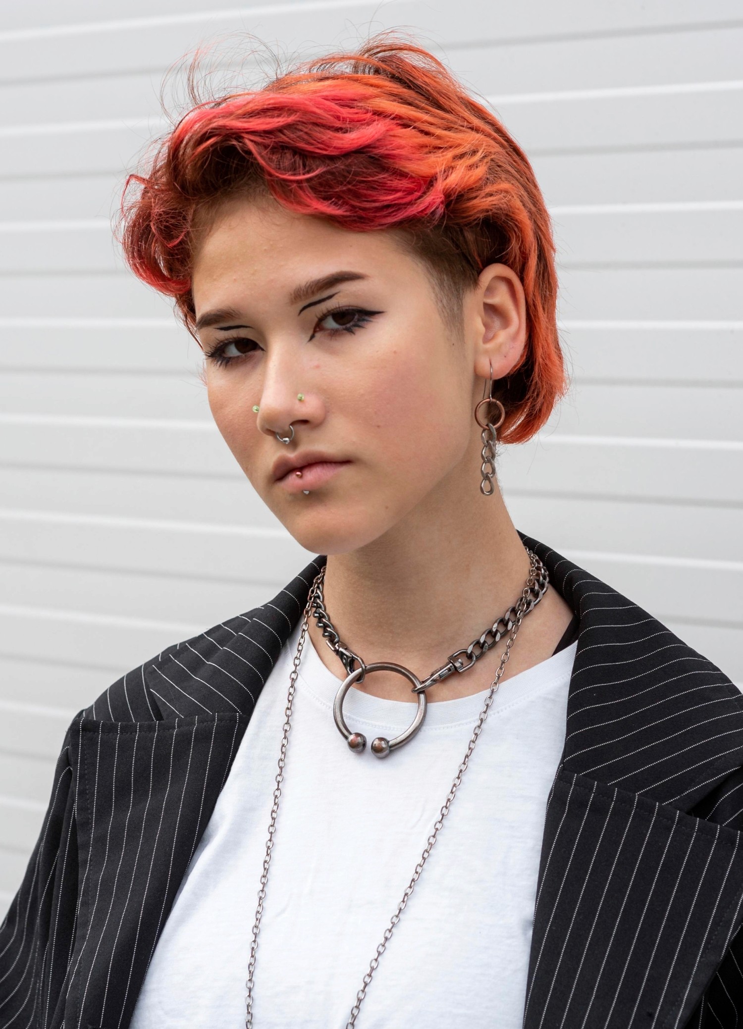 portrait photo of a binary person with red hair