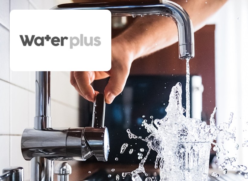 man wearing green crew-neck top and eyeglasses with black frames looking at side