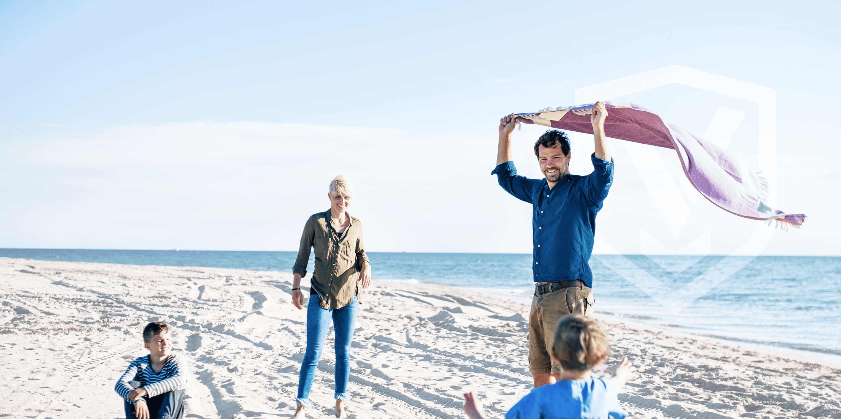 Family in a beach with VNGO logo suipporting all metaphorically