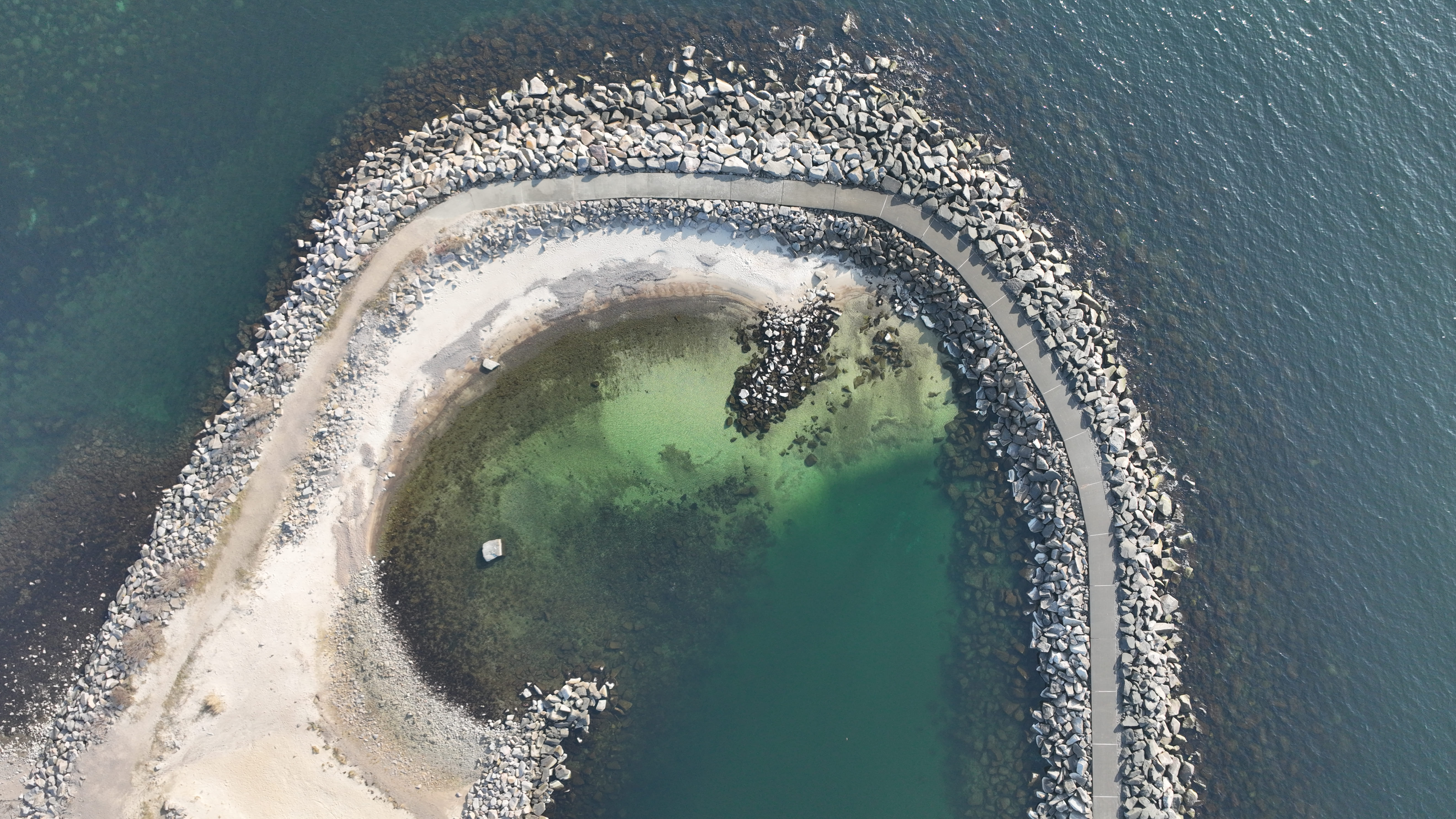 a blue square object on a wooden surface