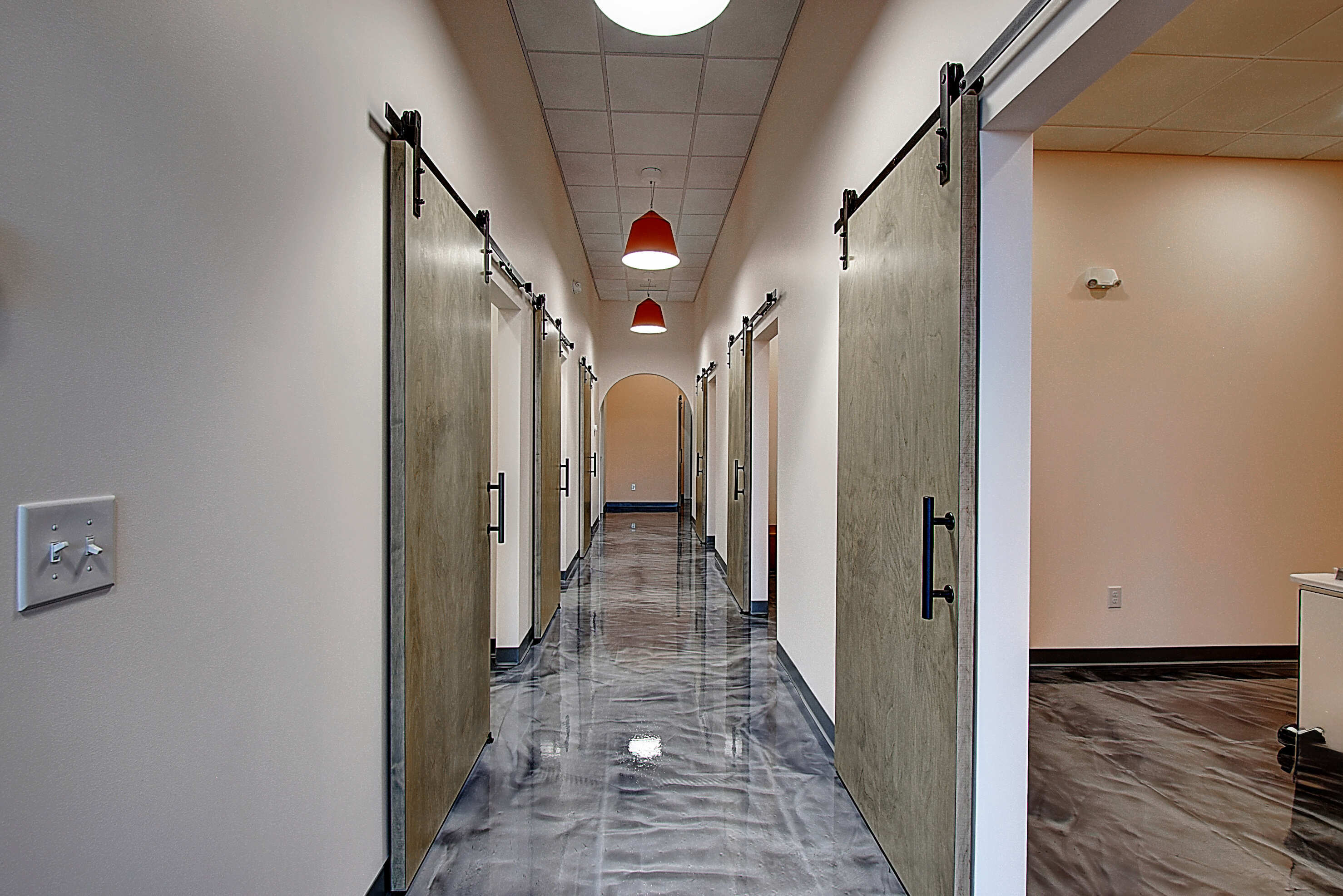 Victory vision hallway with barn doors