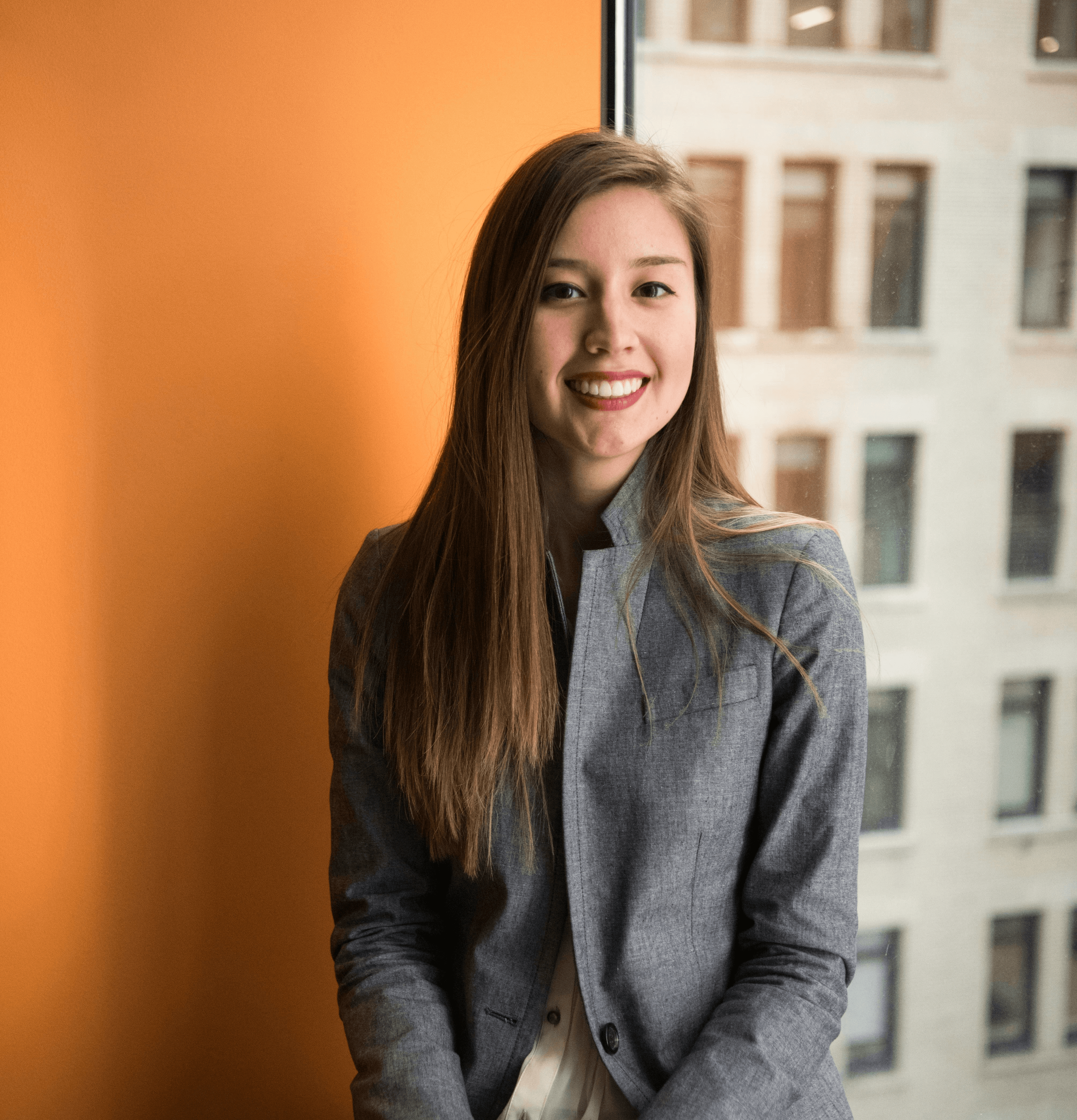 shallow focus photo of woman in gray jacket
