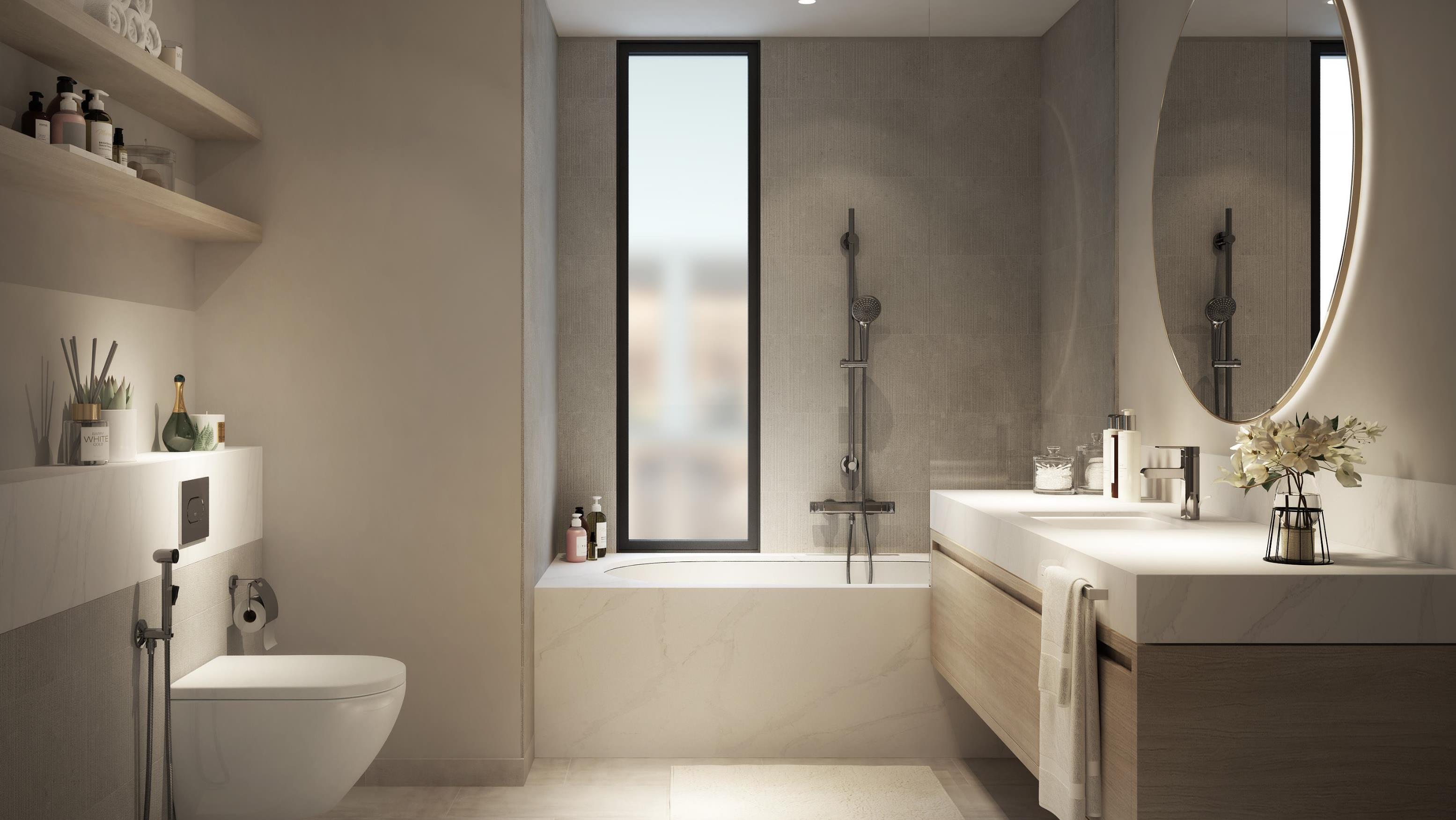 A modern bathroom featuring a large window and a stylish tub, designed for relaxation at Talia at the Valley.