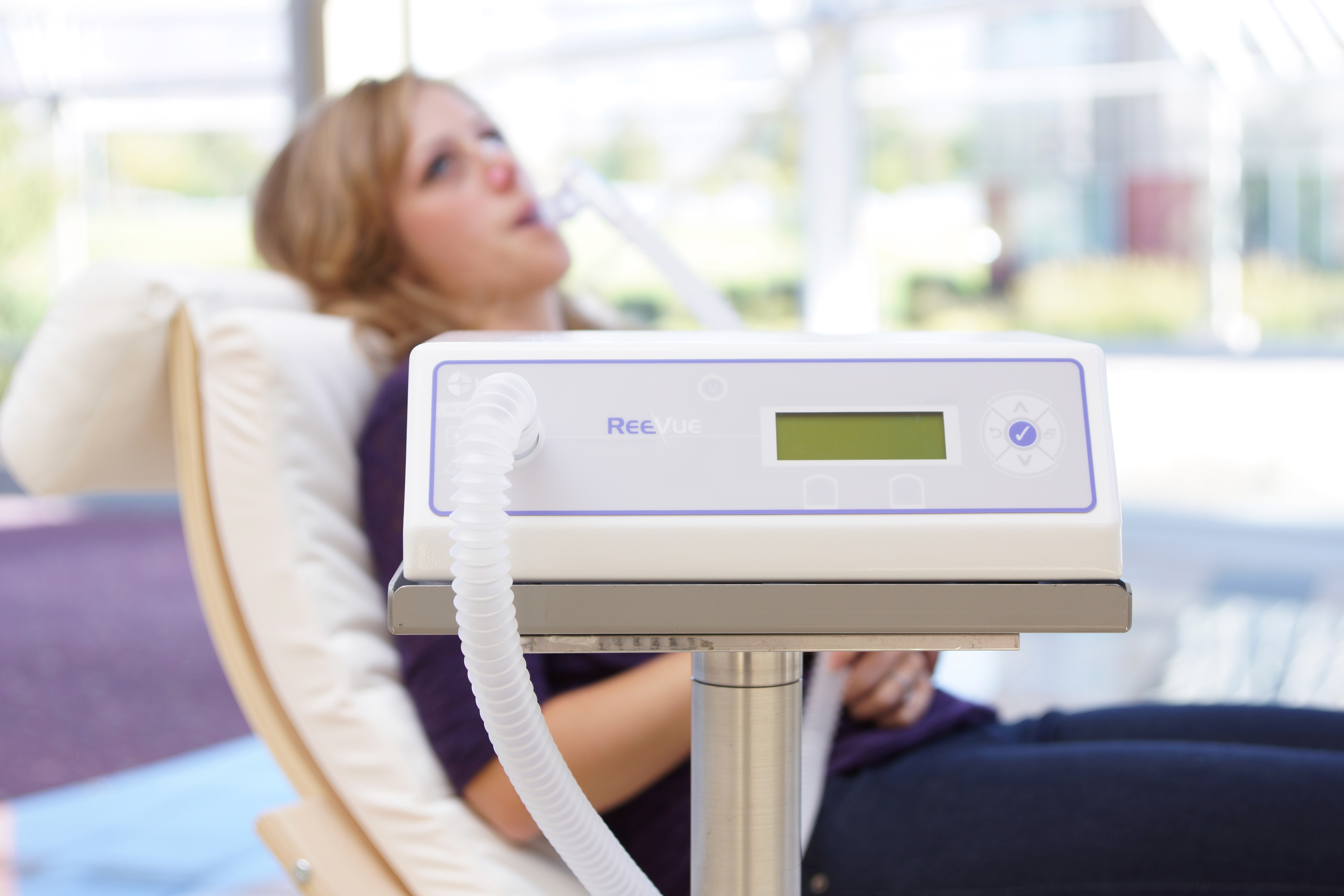 Concierge care member taking a resting metabolic rate test at Harper Health.