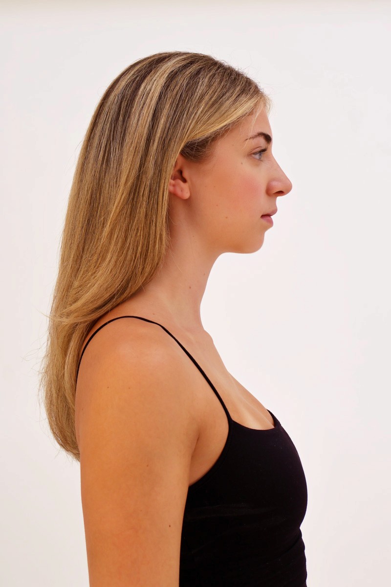 right side-profile headshot of female dancer