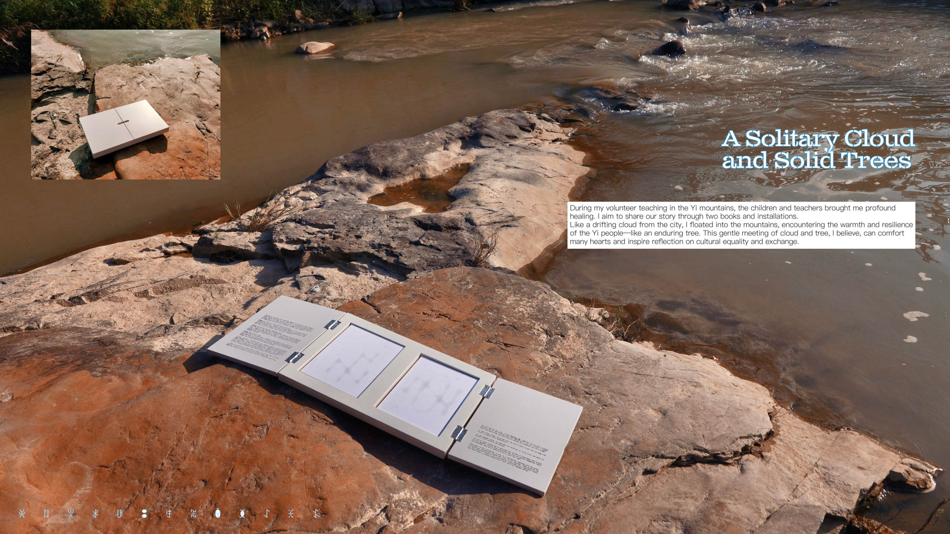 a book on a rock by a river