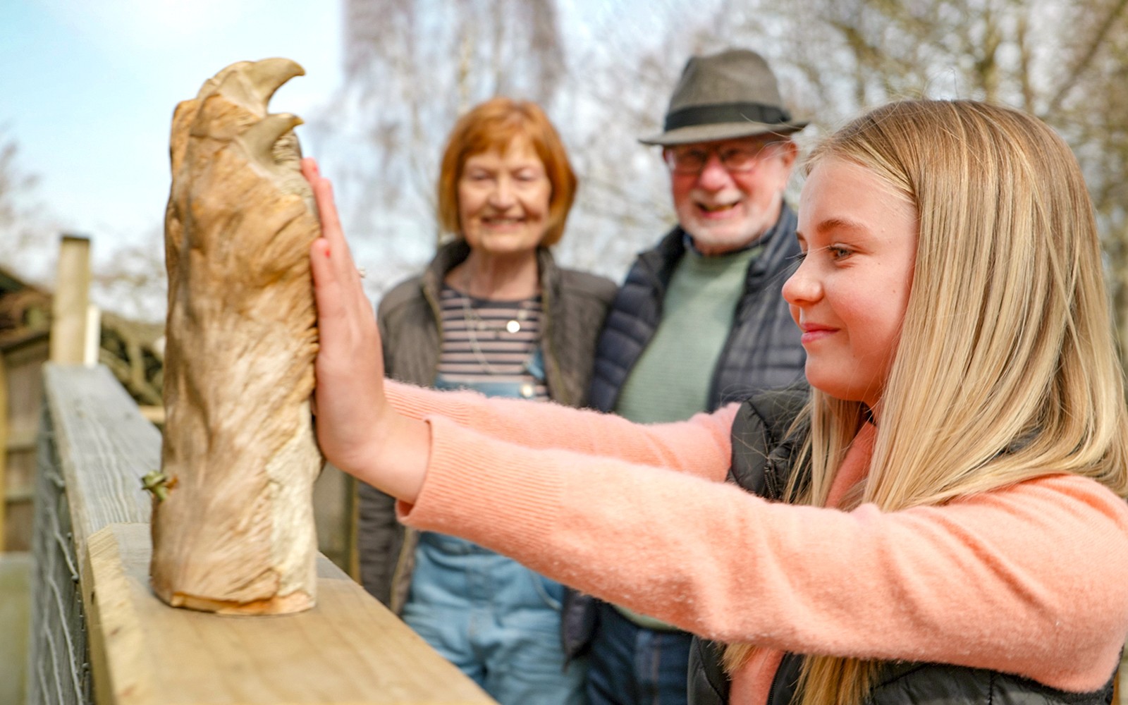 Guests observing animals at Highland Wildlife Park, Scotland.