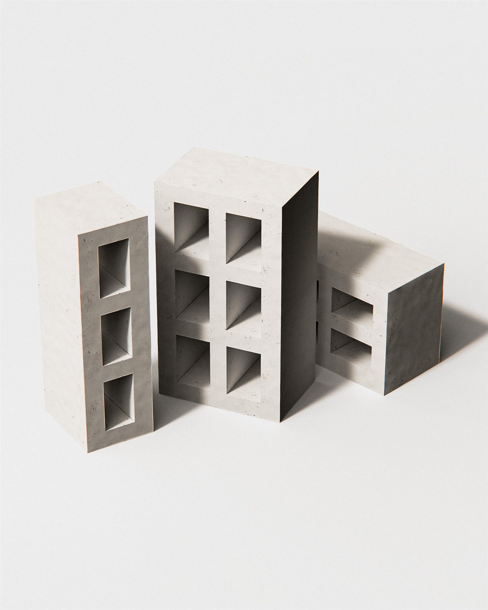 Agrocrete® blocks made from crop residue, fly ash and BINDR™, shown on a plain background