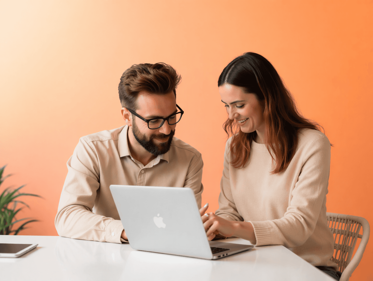man standing behind flat screen computer monitor