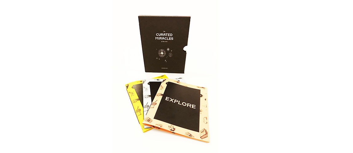 A set of black flyers with cream, white and yellow edges with some patterns.