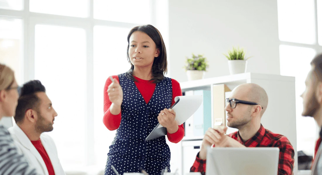 Modern manager using AI tools and dashboards for decisions