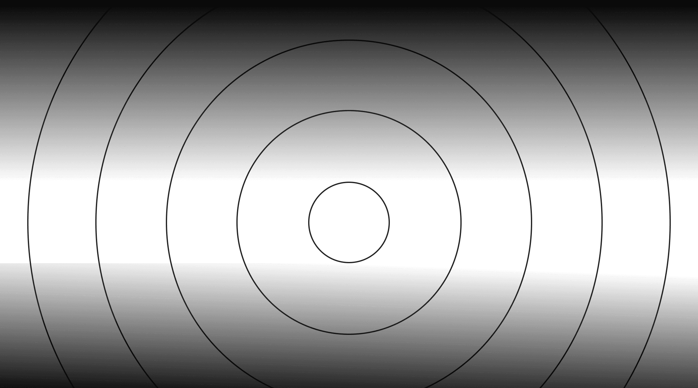 Black background with concentric circles.