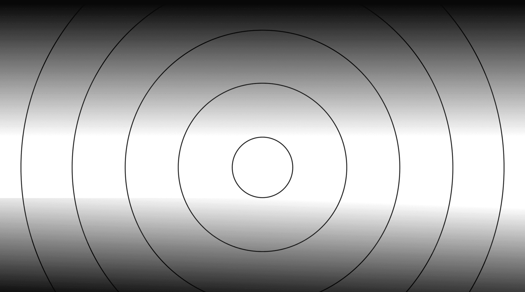 Black background with concentric circles.