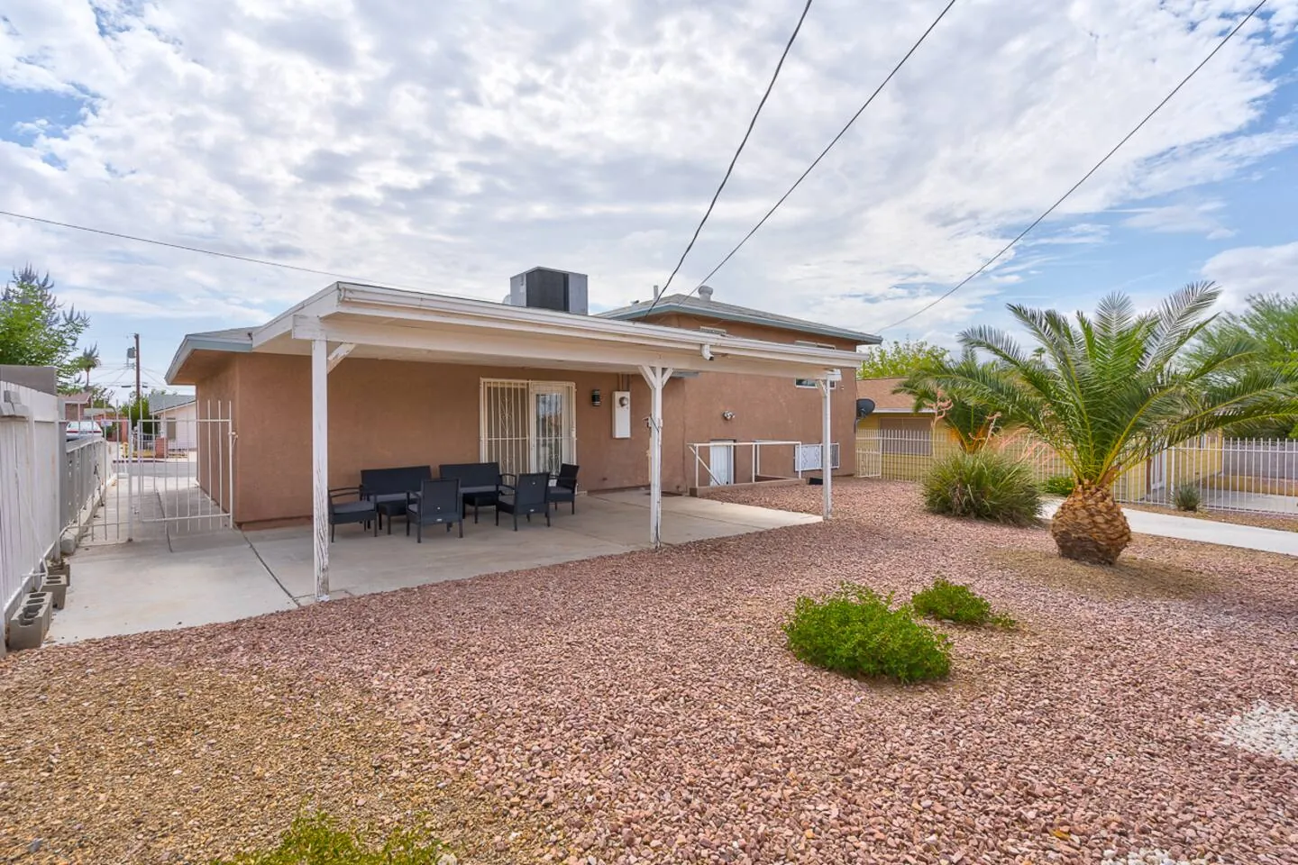 Back patio with desert landscaping, Family Reunion Home in North Las Vegas