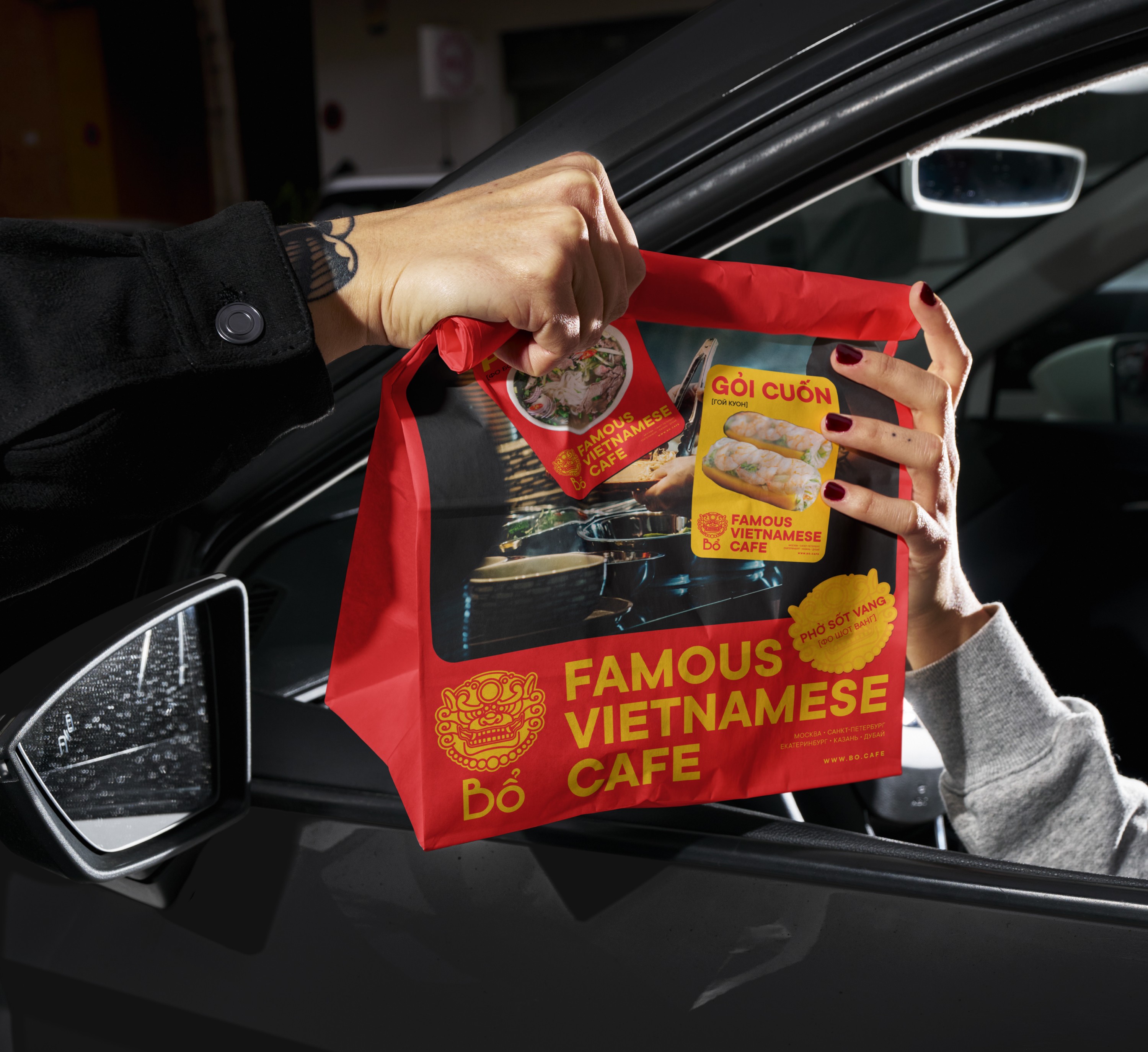 Streetside billboard with flyposters of the Batch.Works brand and illustrations