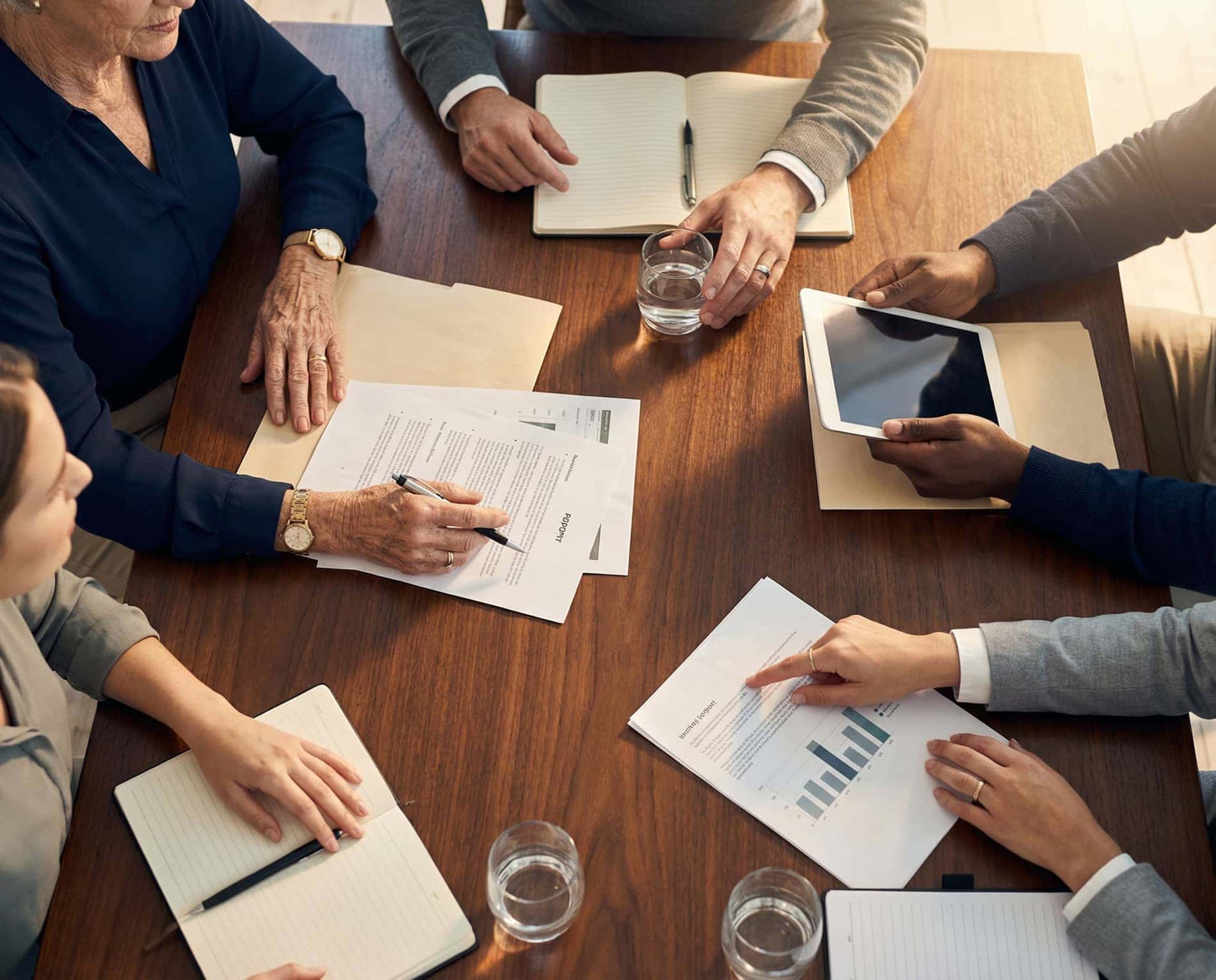 Top-down view of a team working together at a table