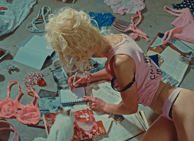 Silhouette of a person walking on a modern walkway