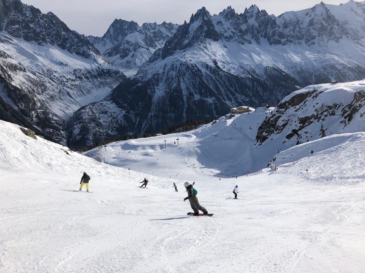 Group of men standing with Sufboard